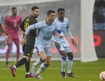 Cristiano Ronaldo y Messi se vieron las caras de nuevo en el terreno de juego. AP/Hussein Malla