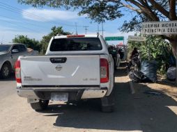 La camioneta donde viajaban los activistas fue hallada baleada sobre la carretera a Manzanillo. SUN