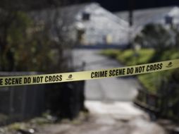 La policía localizó el coche del sospechoso de los disparos y lo persiguió hasta el acceso para coches de otra vivienda, donde fue detenido. ARCHIVO