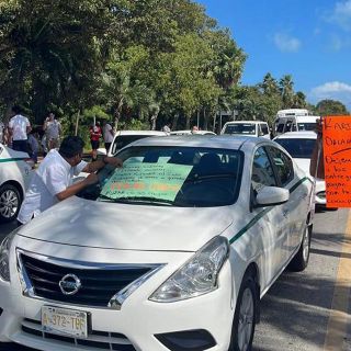 "Están exagerando", López Obrador minimiza alerta de EU por conflicto de taxistas en Cancún