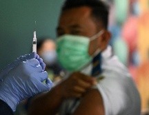 Desde su irrupción a finales de 2019, el COVID-19 ha provocado oficialmente seis millones 804 mil 491 muertes al 27 de enero. AFP/S. Tumbelaka