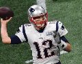 Tom Brady obtuvo seis de sus siete campeonatos con los Patriots. AFP / ARCHIVO