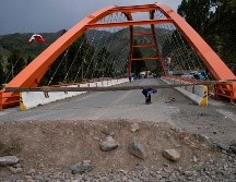 Las lluvias también provocaron deslizamientos de tierra en las carreteras. R. Abd. AP