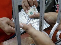 De acuerdo con Banco de México, el tipo de cambio para hoy es de 18.94 por cada dólar. EL INFORMADOR/ARCHIVO