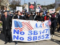También lideraron la marcha legisladores como el miembro de la Cámara de Representantes de Texas, Gene Wu, y la activista Ling Luo. AFP