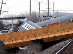 Veinte de los 212 vagones del tren descarrilaron cuando viajaban hacia el sur. AP/D. Lackey