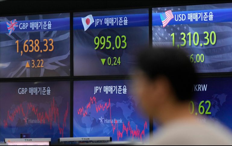 Los sectores que abrían con mayores ganancias eran el de servicios públicos. AP/L. JIN-MAN