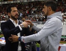 Ambos técnicos lograron llevar a sus respectivos equipos hasta los cuartos de final del torneo. IMAGO7/Archivo