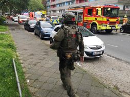 Diez bomberos y dos policías resultaron heridos por el estallido. AP/D. Young