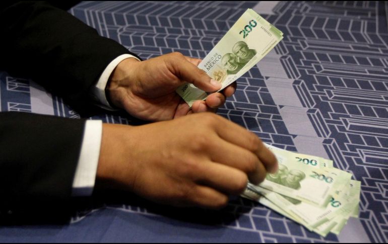 Los mercados accionarios trabajan con pocos cambios, con el dólar apreciándose a lo largo de la jornada. NTX/ARCHIVO