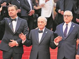 Leonardo DiCaprio, Martin Scorsese y Robert De Niro saludan desde la alfombra roja de Cannes. AFP/V. Hache