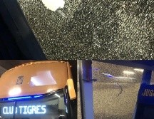 La representación del Club Tigres decidió no presentar cargos para no afectar al causante de romper los cristales del camión de los regiomontanos. ESPECIAL