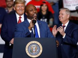 Donald Trump, Lindsey Graham y Tim Scott. AP