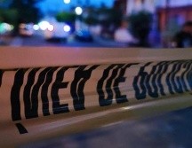 Peritos del Instituto Jalisciense de Ciencias Forenses (IJCF) se encargaron del levantamiento de los tres cuerpos. ARCHIVO