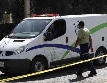 Peritos del Instituto Jalisciense de Ciencias Forenses colaboraron en la fijación y recolección de evidencias. ARCHIVO