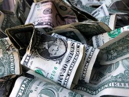 El peso mexicano cotiza en los mercados internacionales alrededor de los 19.46 pesos por dólar. AP/ ARCHIVO