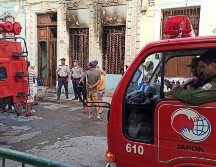 Los vehículos eléctricos estaban en la sala de la vivienda. AP