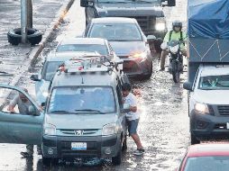 La lluvia suele resultar un contratiempo en Guadalajara. EL INFORMADOR/ ARCHIVO