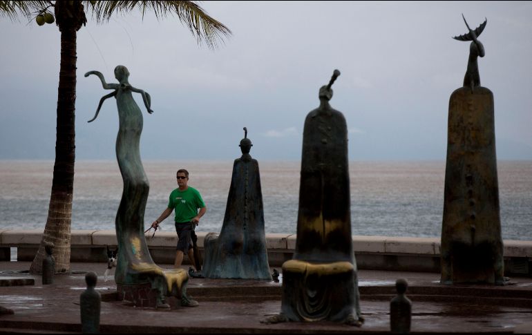 Para el Pacífico Centro, el pronóstico es de cielo nublado la mayor parte del día, con lluvias puntuales intensas en Jalisco, y muy fuertes en Nayarit, Colima y Michoacán. AP / ARCHIVO