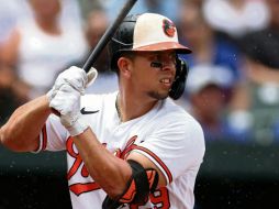 Ramón Urías castigó a su compatriota Julio Urías, pitcher de los Dodgers. AFP/R. Carr