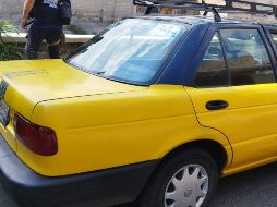 Los agentes observaron a dos individuos a bordo de un taxi y notaron que llevaban consigo un arma de fuego. ESPECIAL