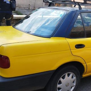 Detienen a dos hombres en taxi con una pistola en Santa Elena Alcalde