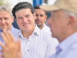 Andrés Manuel López Obrador, de visita en Monterrey, señaló al gobernador de Nuevo León, Samuel García (centro), como un posible candidato presidencial. ESPECIAL