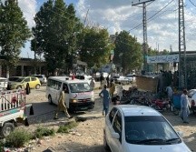 Unas mil personas estaban en el mitin político. AP