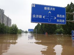 La zona más afectada es Hebei, cerca de Beijing, donde enormes extensiones de agua inundan la provincia a lo largo de kilómetros. AFP