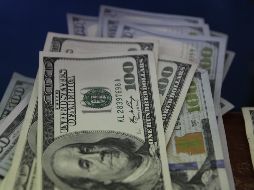 El peso mexicano se ubica en los mercados internacionales alrededor de los 17.04 pesos por dólar. EL INFORMADOR/ ARCHIVO