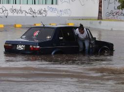 El Área Metropolitana de Guadalajara (AMG) registró una fuerte tormenta ayer jueves, el último día de agosto, que provocó severas inundaciones. EL INFORMADOR / ARCHIVO