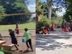Un video se hizo viral en las redes sociales, mostrando a los niños corriendo por lo que parecían ser los campos de juego de la escuela, mientras que algunos de ellos se agachaban para protegerse. ESPECIAL