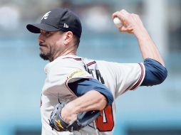 Charlie Morton, uno de los ases de la rotación de los Bravos, estaría reapareciendo en una eventual Serie de Campeonato. AFP/H. How