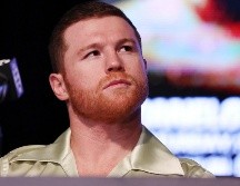 Canelo estuvo cerca de no dedicarse al boxeo, pero es ahí donde una promesa de su hermano Rigoberto a su padre terminó por encaminar a Saúl a una vida llena de gloria deportiva. AFP / ARCHIVO