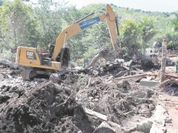 Efectivos del Ejército prestan atención de emergencia en la zona del desastre en Autlán. AFP/U. Ruiz