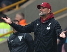 JURGEN KLOPP. La victoria hubiera dejado a Liverpool como líder, por encima del actual campeón Manchester City. AFP / ARCHIVO