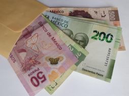 Esta prestación, el aguinaldo, surgió en la Ley Federal del Trabajo en 1970, y es una obligación de las empresas entregarlo anualmente antes del 20 de diciembre. ESPECIAL / Gobierno de México