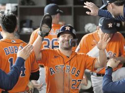 José Altuve conectó un cuadrangular de tres carreras en la novena, dándole la vuelta a la pizarra. AP