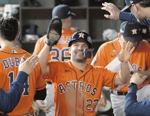 José Altuve conectó un cuadrangular de tres carreras en la novena, dándole la vuelta a la pizarra. AP