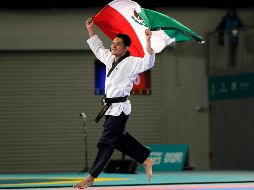 William Arroyo ganó la primera medalla de oro de Santiago 2023 al superar en taekwondo al nicaragüense Martín Ortega en la modalidad de poomsae. AFP
