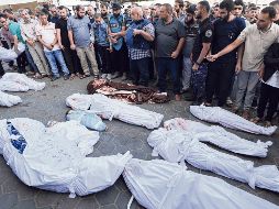 En distintos enclaves se han visto cuerpos de niños fallecidos en este conflicto. AFP