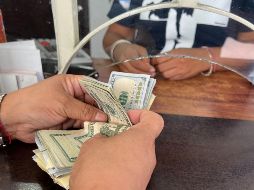 La divisa nacional en los mercados internacionales se ubica en los 18.03 pesos por dólar al mayoreo. EL INFORMADOR / ARCHIVO