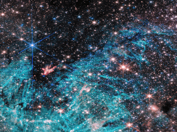 La región de formación estelar, denominada Sagitario C (Sgr C), está a unos 300 años luz del agujero negro supermasivo central de la Vía Láctea, Sagitario A*. ESPECIAL / NASA, ESA, CSA, STScI y S. Crowe (Universidad de Virginia).