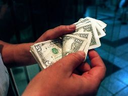 En la sesión overnight, el tipo de cambio presentó volatilidad con sesgo bajista. SUN / ARCHIVO