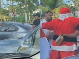 Todo apuntaba a que ambas personas de sexo masculino comenzarían un pleito, sin embargo, un Santa Claus que se encontraba en la calle repartiendo regalos llegó a calmar la situación. ESPECIAL