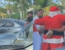 Todo apuntaba a que ambas personas de sexo masculino comenzarían un pleito, sin embargo, un Santa Claus que se encontraba en la calle repartiendo regalos llegó a calmar la situación. ESPECIAL