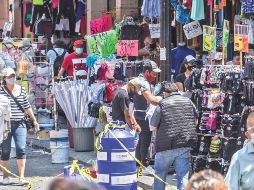 En otras palabras, por cada 100 pesos del PIB del país, las y los ocupados formales generaron 76 pesos y quienes están en la informalidad, 24 pesos. SUN / ARCHIVO