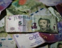 A contramano, entre las monedas más apreciadas este año se encuentran Afgani de Afganistán (27,72%), peso colombiano (23,22%), peso mexicano (13,22%). EFE / ARCHIVO