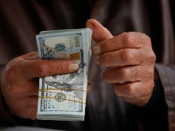 Analistas del Banco Base, apuntaron a que el mercado redujo las apuestas de un recorte a la tasa de interés de la Reserva Federal el próximo 20 de marzo. AFP / ARCHIVO