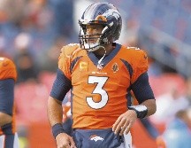 La titularidad de Russell Wilson fue condicionada a la reestructura de su contrato con los Broncos. AFP